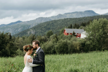 Newlyweds hugging each other in the manor